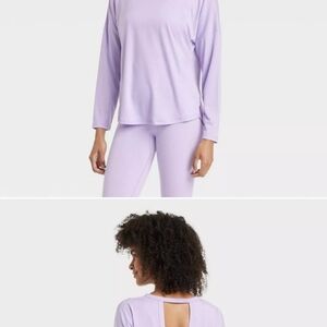 Stay comfortable during your workouts with this lavender All In Motion top in XL